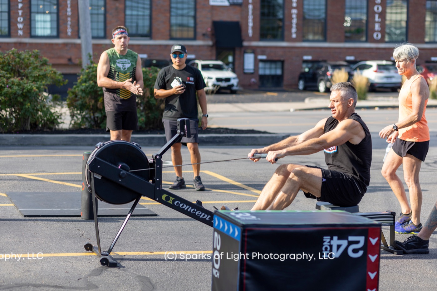 Competitors and judges during the rowing zone at the Ruckhouse DEKA event in Rochester NY